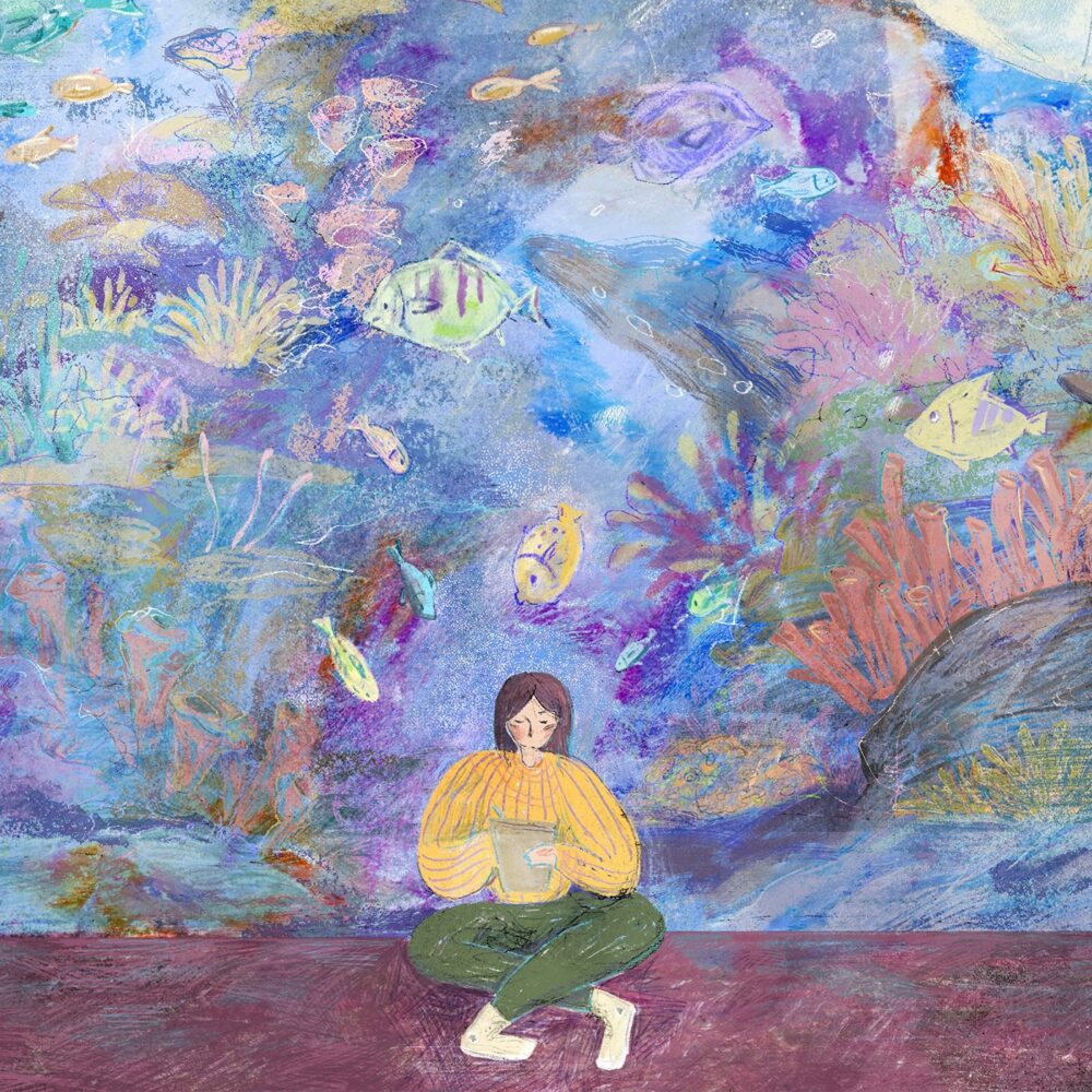The Under the Sea art print features a person sitting cross-legged with a book, surrounded by a vivid underwater scene of fish and coral blending into the space. The dreamy, surreal atmosphere offers a whimsical escape perfect for any setting.