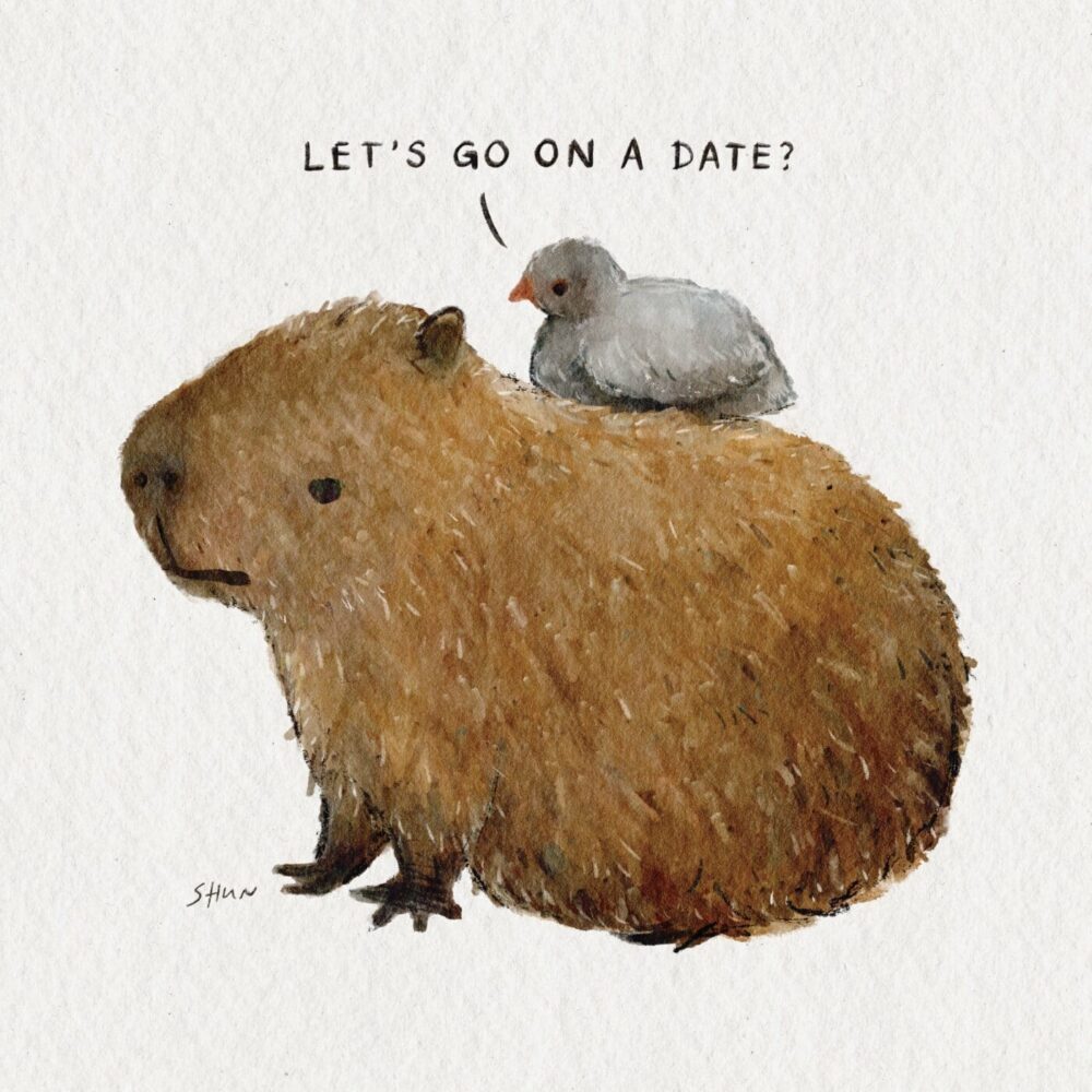 The Capybara & Pigeon watercolor art print portrays a capybara with a bird on its back, asking, Lets go on a date? against a white background. Its signed by SHAN.